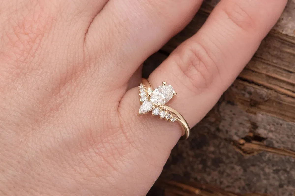 A Unique Oval 0.50 ct Diamond Ring with a Curve Band
