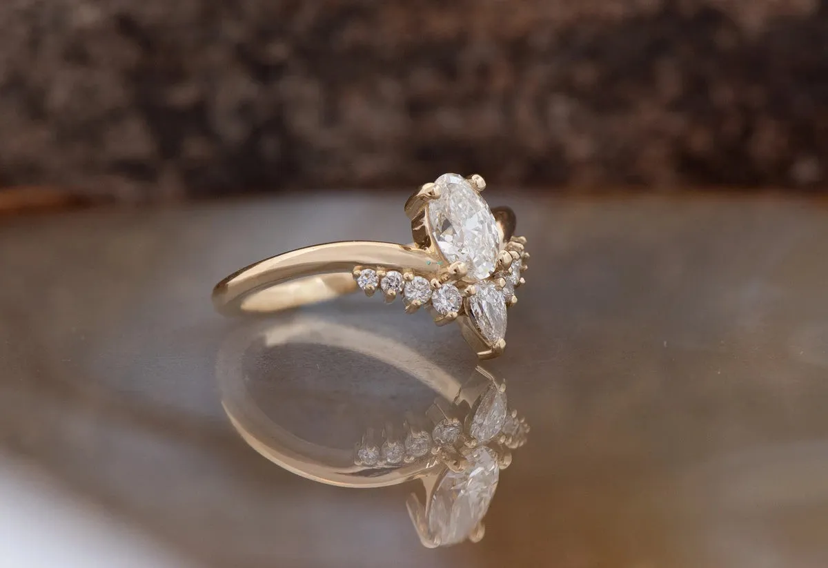 A Unique Oval 0.50 ct Diamond Ring with a Curve Band
