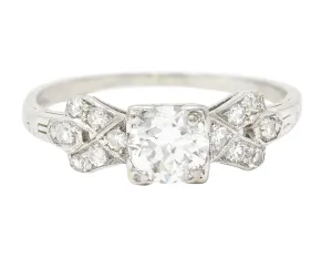 Art Deco 0.64 CTW Transitional Cut Diamond Platinum Buckle Engagement Ring