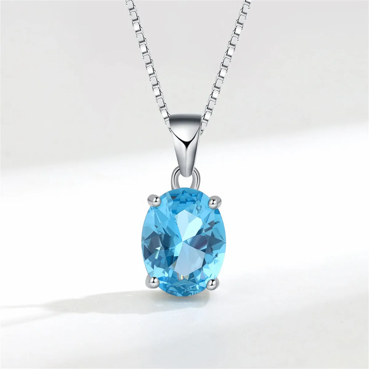 Blue Crystal & Silver-Plated Oval Pendant Necklace