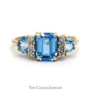 Emerald Cut Blue Topaz Ring with Trillion Cut Sides and Diamond Accents in 10k Yellow Gold