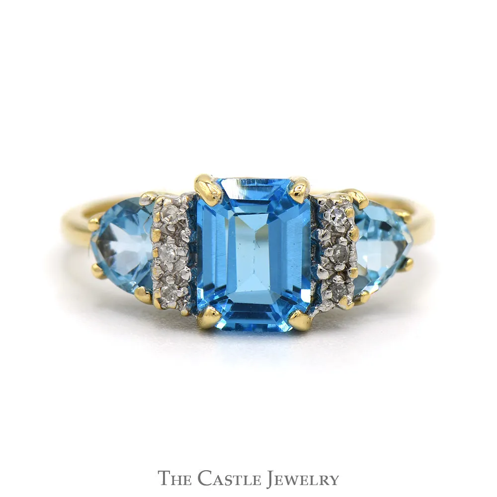 Emerald Cut Blue Topaz Ring with Trillion Cut Sides and Diamond Accents in 10k Yellow Gold