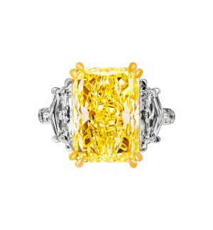 GIA Certifies 3 stone ring with 6.57ct Fancy Light Yellow Radiant Cut Diamond
