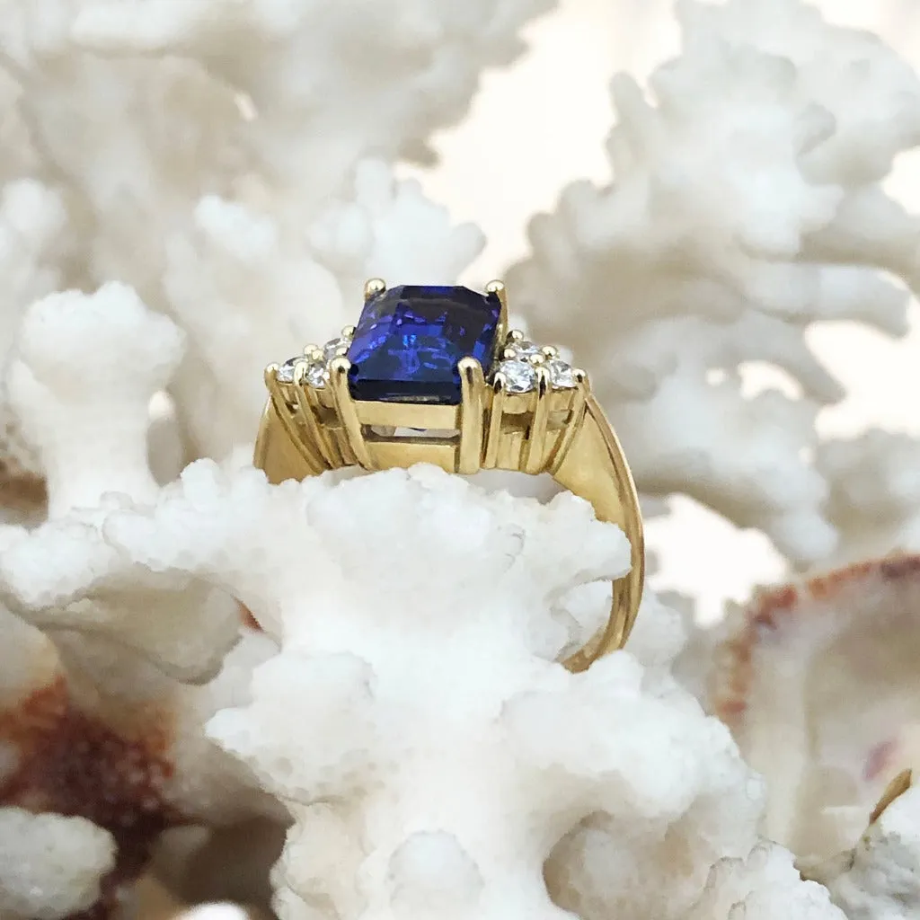 Handcrafted Emerald Cut Tanzanite Ring with Trilogy Diamond Accent