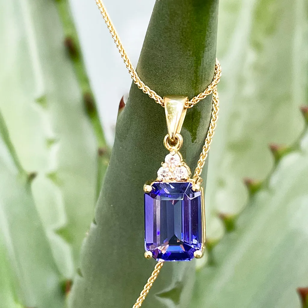 Handcrafted Emerald Cut Tanzanite Yellow Gold Pendant with Diamond Trilogy Detail