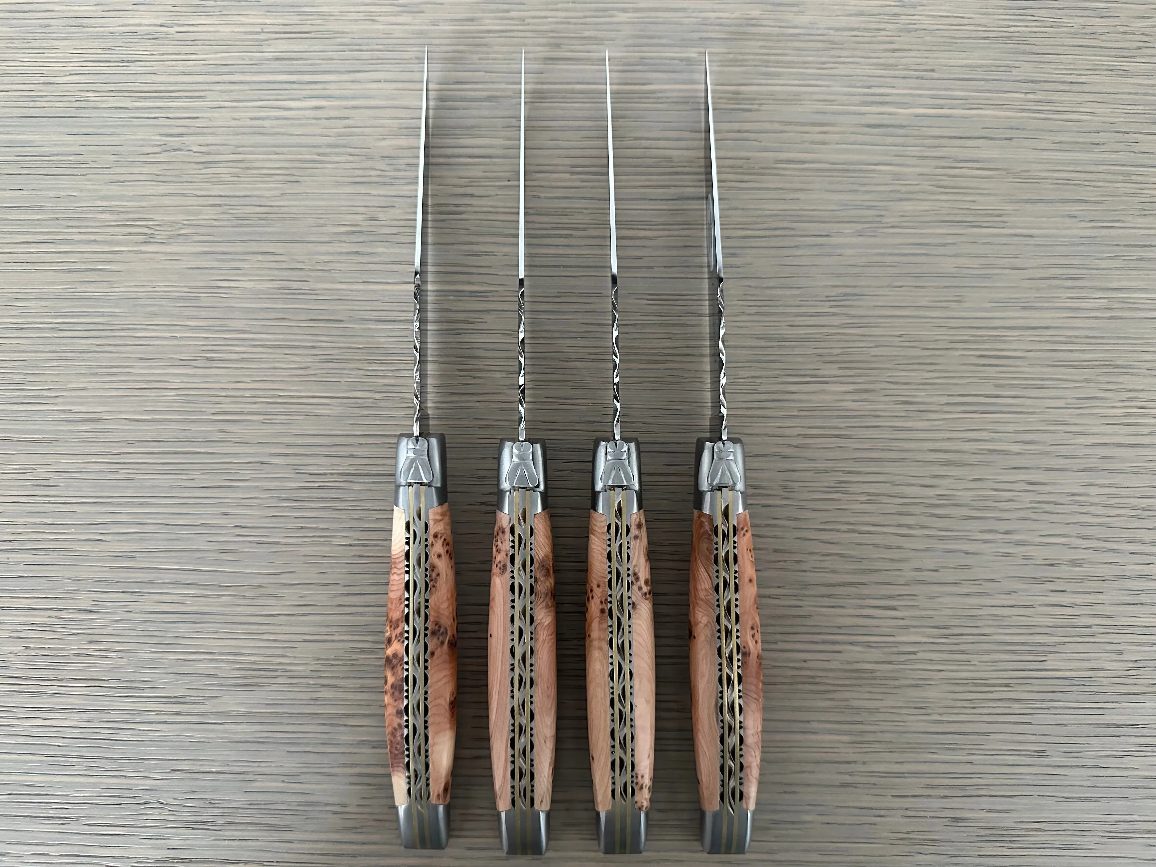 Laguiole en Aubrac Luxury Handcrafted Stainless Steel & Brass Double Plate 4-Piece Steak Knife Set with Juniper Wood Handles