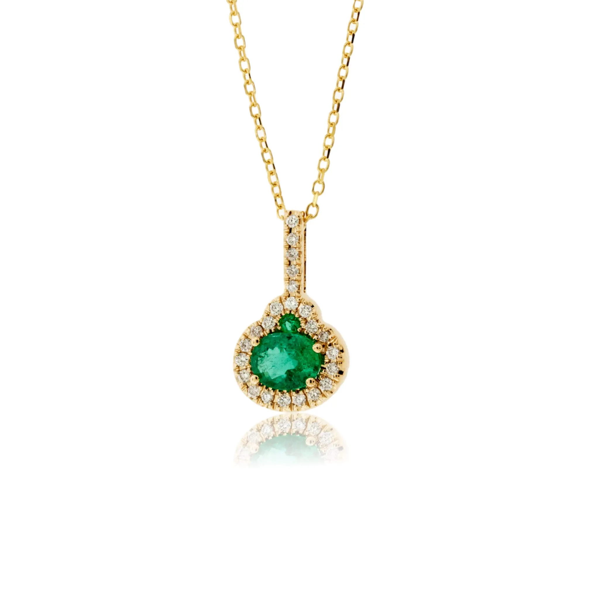 Oval Shaped Emerald Pendant with Diamond Halo